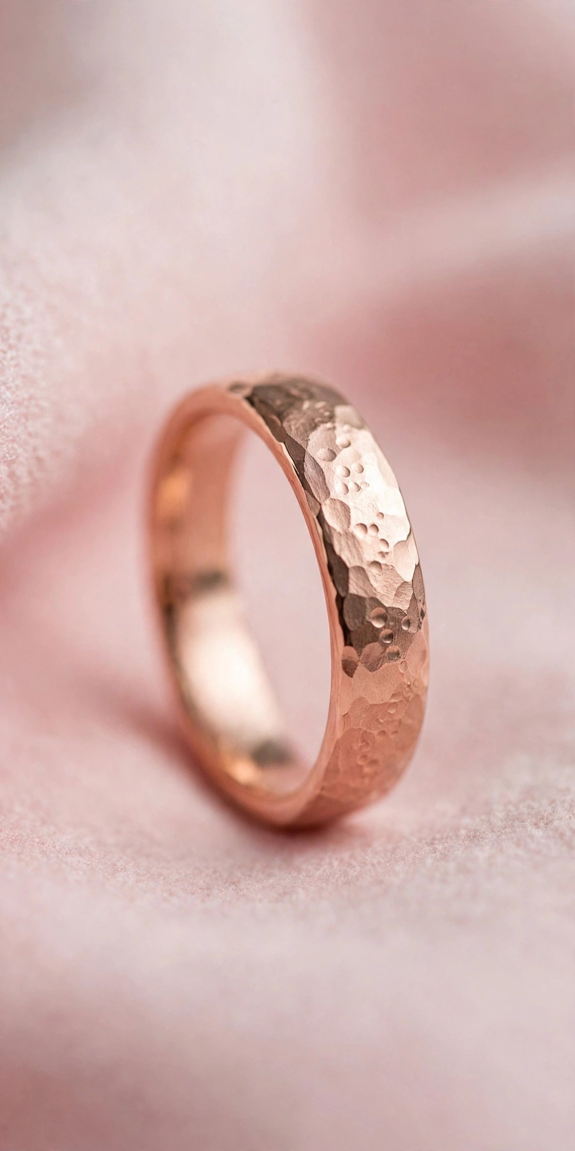 Rose Gold Hammered Band — rose gold wedding band on a soft pink background