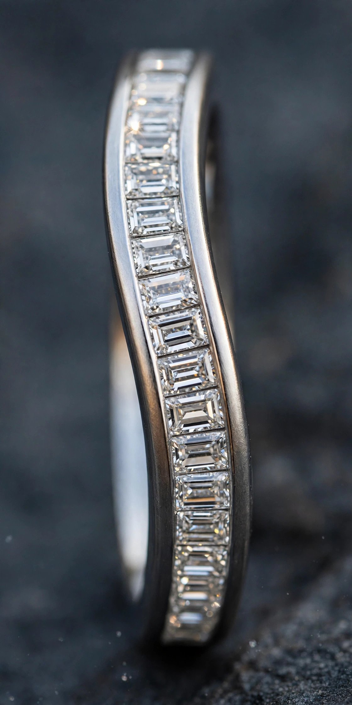Curved band with channel set baguette diamonds